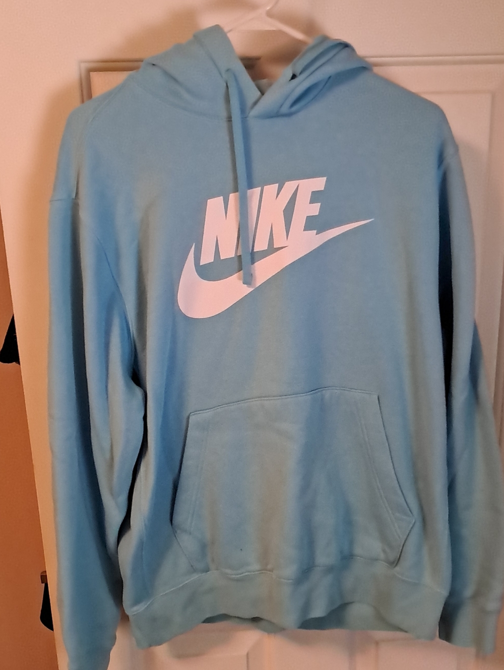 Nike Light Blue Hoodie with White Swoosh Logo